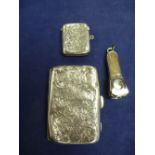 Silver handled cigar cutter Birmingham 1978, Edwardian silver Va case and a Silver cigarette case