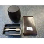 Three items of 1930s Bakelite to include cigarette case, a similar dispenser and barrel shaped ash