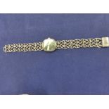 Lady's Omega wristwatch on a silver curb link style strap A/F stamped 925