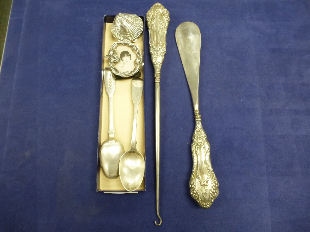 Silver including a modern shell pill box, miniature photograph frame, 2 Georgian silver teaspoons,