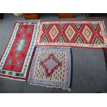 Three small Kelim style rugs