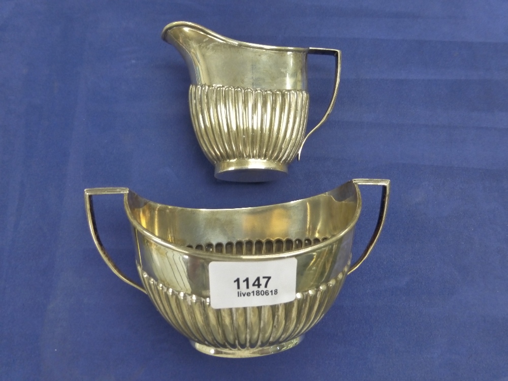 Edwardian silver double handled sugar bowl with half gadroon decoration, Sheffield 1903 and a