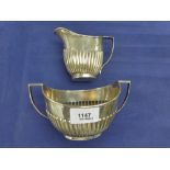 Edwardian silver double handled sugar bowl with half gadroon decoration, Sheffield 1903 and a