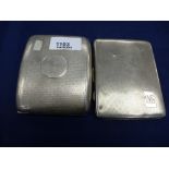 Two silver cigarette cases both with engine turned decoration and engraved with initials, 8.8 troy