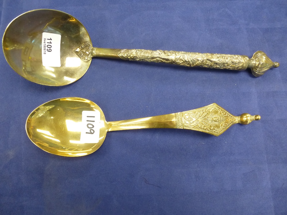 Large Siam sterling silver serving spoon with embossed figural handle and plain bowel 31cm long - Image 2 of 2