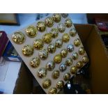Box of vintage military badges, buttons etc.