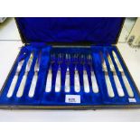 Cased set of six Edwardian silver plated fruit knives and forks with silver collars and Mother of