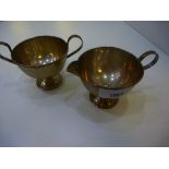 Plain silver cream jug and sugar bowl, each stamped National Sterling weighted to base