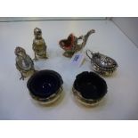 Collection of silver and white coloured metal salts, incl. fish mustard pot and spoon, cruet set