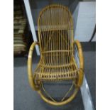 A vintage cane and bamboo rocking chair probably 1960's/70's