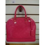 A Louis Vuitton Rose Pop Alma ladies handbag, size p.m.