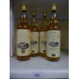 Three bottles of The Wine Society, Speyside Malt whiskey and a similar bottle of pure malt whiskey