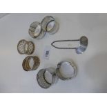 pair of heavy silver serviette rings, 2 other silver serviette rings, silver 'Sherry' label etc. ,