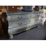 A French painted pine bombe ch with three long drawers with a marble style top 164cms