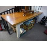 A Large rectangular farmhouse table with oak tongue and groove top on a painted base 240cms