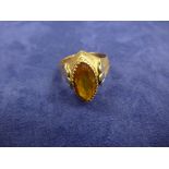 18ct yellow gold dress ring set with marquise amber coloured stone stamped 750 size O gross weight
