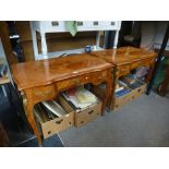 A pair of French style three drawer writing tables with gilt metal mounts