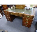 A Reproduction mahogany military style twin pedal desk with twelve drawers 152cms