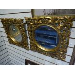 Pair of modern gilt wall mirrors with pierced decoration