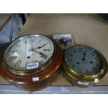 Ships brass bulkhead clock and an old mahogany circular wall clock