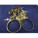 Two silver charm bracelets, two silver bangles 3.7 toz a white coloured metal bracelet set with