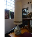 A 1970's pottery glazed globular lamp with large fabric shade