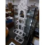 A Victorian painted cast iron hallstand with inset mirror, 66cms