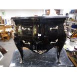 A French style black glass ch with two drawers with silvered mounts