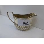 Small late Victorian silver cream jug, half gadroon decoration Sheffield 1888 ,2 troy oz