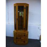 Robert 'Mouseman' Thompson, an oak standing corner display cupboard having leaded glass panels 74cm