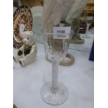 An antique probably 18th Century wine glass with air twist stem