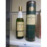 Bottle of Glenlivet, 12 year aged malt whiskey, 70cl in green cylindrical tube