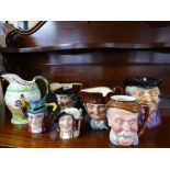 A Crown Devon musical jug, three Doulton character jugs and 3 others