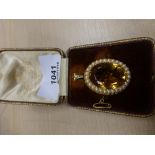 15ct gold pendant / brooch set with large yellow stone surrounded by seed pearls in original