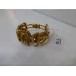 Good quality gilt metal hinged snake bangle by Askew of London