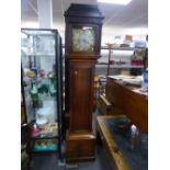 An antique oak longcase having 26cm brass dial by Fordham, Braintree, 30 hours