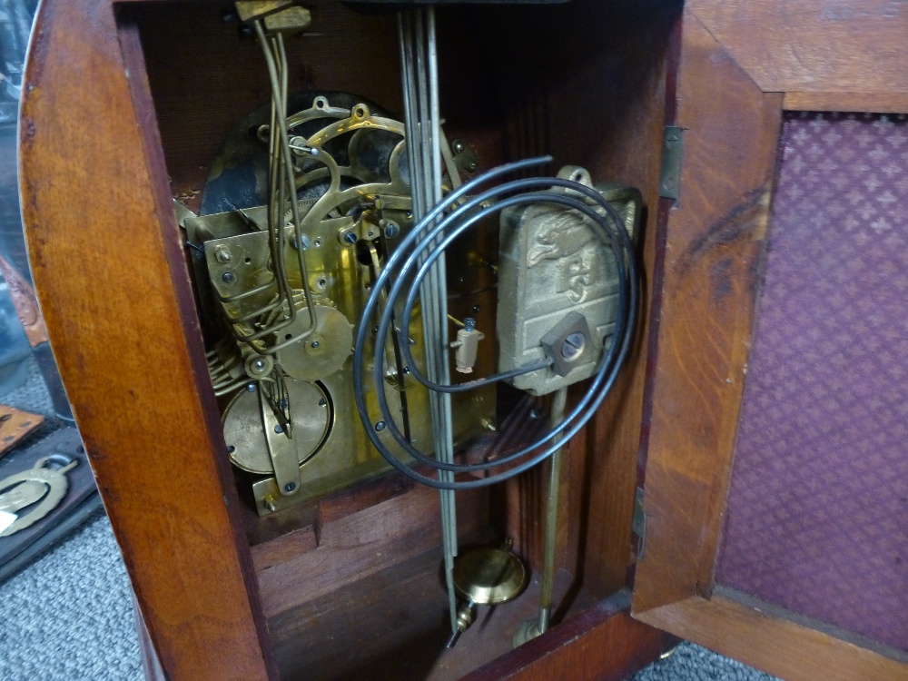 An Edwardian inlaid mahogany chiming mantle clock with an arched top, 41cms - Image 3 of 3