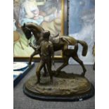 A modern bronze sculpture of a horse and rider on a marble base after Edgar Bertram 49cms