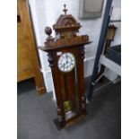 A 19th Century walnut Vienna clock, 41.5cms