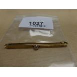 15ct gold bar brooch set with a seed pearl marked 15ct, approx 2g