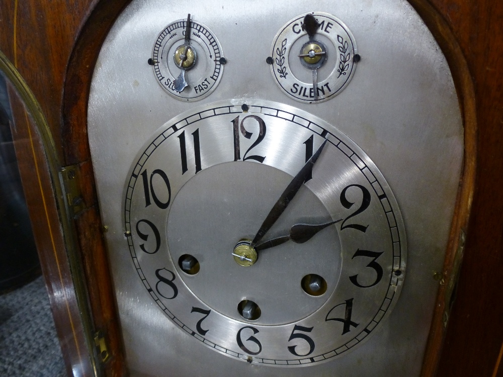 An Edwardian inlaid mahogany chiming mantle clock with an arched top, 41cms - Image 2 of 3