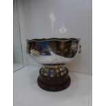 Silver plated on copper presentation punch bowl with lion mask ring handles, 27cm diameter on a