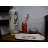 A large Poole vase decorated birds and flowers 43cms and three other items of Poole
