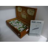 A boxed mah-jong set