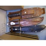 Three hunting knives in leather sheaths to include a John Nowill .Bowie' example