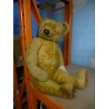 Vintage straw filled teddy bear