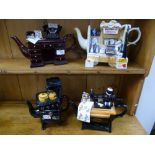 Four novelty teapots to include a sewing machine and pedestal desk examples