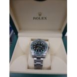 Brand new 2018 40mm Rolex 'Submariner' watch with green ceramic bezel and a green dial with date