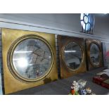 Three modern porthole style mirrors in square frames