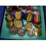 Collection of WWI medals including British Campaign medals, Victory medals, Mercantile marine